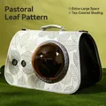 Portable pet carrier featuring green leaf print and tinted space capsule window - Pastoral Leaves