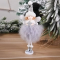 Handmade Christmas angel figurine with grey feathers and silver star ornament on wooden table - Blue Feather Standing Angel