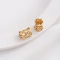 Macro shot of 14K gold plated hollow floral spacer beads with sparkling zircon stones - 17# Hollow Butterfly Flower / 10x8mm / 14K Gold