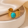 Detail of gold-plated open ring with green turquoise stone and hollow pattern - Openwork Blue Natural Stone Adjustable Style (TYR0820)