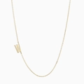 Minimalist gold necklace featuring a stylized letter W pendant on a delicate chain - Letter W