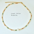 Detail view of beaded necklace with pearls, specifying 38+5cm length and 10g weight - Light Yellow Red Green Faceted (1139)