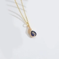 Collana a pavone dorata con gemma blu a goccia e cristalli bianchi scintillanti - Oro Blu Scuro Pavone