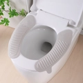 Gray EVA waterproof toilet seat pad with anti-slip stripes and lift handle design - Solid Grey