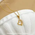 Golden heart necklace in titanium steel with sparkling zircon accents on white stone - No. 4 N0111 Gold