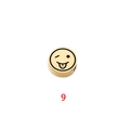 Detailed view of a gold stainless steel round bead with a wink emoji laser engraving - Expression 9