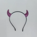 Detail of purple glitter devil horn headband featuring shimmering party texture - Purple Glitter Small Horn
