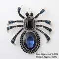 Macro detail of spider brooch showing blue gemstones and measurements of 6.4x6.7cm - Blue Spider (XZ25051)