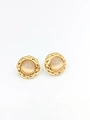 Vintage gold stud earrings with light cat-eye stone and quilted metal border - Transparent Yellow