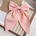 Pink satin double-layered bow hair clip with long ribbons on a vintage jewelry display - Pink Long Ribbon