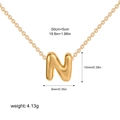 Detail of 3D bubble letter N pendant necklace showing 18k gold plating and measurements - Letter N