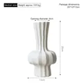 Medium size white ribbed ceramic vase with matte finish and vertical striped texture - White Medium Style