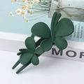 Matte dark green double butterfly hair clip displayed on a minimalist white book - Dark Green