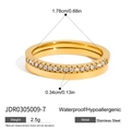 Bague en acier inoxydable doré avec zircons blancs et largeur de 0,34 cm - Style Pavé Doré (JDR0305009-7)