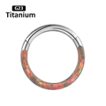 Close-up of G23 titanium septum ring featuring inlaid vibrant orange fire opal stones - OP15 Orange Red Opal