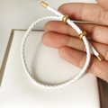 Adjustable white leather cord bracelet featuring elegant gold figure-eight slide buckles - White