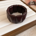 Detailed close-up of dark brown geometric resin blocks on a luxury elastic bracelet - Square Block Style / Coffee