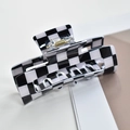 Detail of black and white checkerboard hair claw clip with hollow rectangle design - Rectangular Claw Clip / Black/White Plaid Rectangle