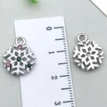 Enamel snowflake pendant charm with pink rhinestones and metal alloy finish - White K Snowflake 16x14mm
