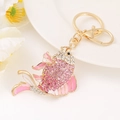 Close-up of golden fish keychain featuring pink enamel and sparkling crystals - Goldfish 4 (Pink)