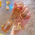 Capybara keychain with transparent square charm and brown BOOM fabric wrist strap - Liquid Sand Capybara-Hug