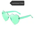 Luminous green heart-shaped rimless sunglasses with integrated glow-in-the-dark lenses - Luminous
