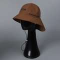 Detail of tear-resistant nylon hiking hat with adjustable drawstring and windproof cord - M (56-58cm) / Caramel color