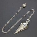 Macro view of silver dowsing pendulum with engraved hexagram patterns and metal chain - Silver