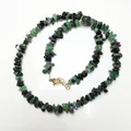 Detailed view of Ruby Zoisite chip stone necklace with adjustable gold clasp - Ruby Zoisite