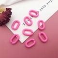 Flat lay of pink acrylic U-shaped chain links with decorative dried flower and card - Solid U-Shape Link / 100 Pcs/Pack (14x9mm) / Pink