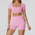 Pink seamless yoga set with ribbed fabric U-neck crop top and high-waisted gym shorts - S / Short Sleeve + Shorts / Bubble Pink