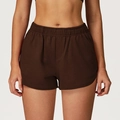 Deep brown high-waist sports shorts with elastic waist and side pockets for women - S / Coffee