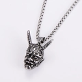 Detailed close-up of a vintage silver bull skull pendant with intricate facial carvings - Steel Color (With 0.35x60cm Chain)