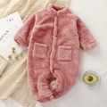 Pink long sleeve plush baby romper in soft fleece with front buttons and two small pockets - 66cm / Pink