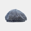 Close-up of blue denim beret fabric texture and stitching details with top button - One Size / Denim Blue