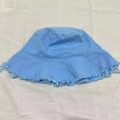 Light blue canvas bucket hat with frayed edges shown in a flat lay minimalist casual style - M (56-58cm) / Sky Blue