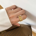 Close-up of gold M-letter ring with chain design worn on finger for a stylish look - US 7 / Letter M Style (MOM Engraved)