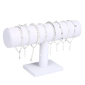 Witte T-standaard voor sieraden met zilveren armbanden en ster-hangers - Wit Fluweel