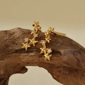 Eleganti orecchini a stella in argento S925 dorato con zirconi lucenti su legno - Argento 925 / Oro 18K