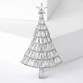 Macro detail of silver Christmas tree brooch with sparkling rectangular crystals on top - Silver