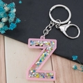 Pink acrylic letter Z keychain with colorful sequins and silver lobster clasp - Letter Z