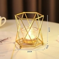 Modern geometric gold metal candle holder with hexagonal frame and glass cup - Small / Gold