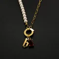 Elegant stainless steel necklace with pearl chain, Gothic 'b' and red gem pendant - Gothic Letter B / Gold