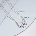 Collana in argento con ciondolo a fiocco e pietre pavé lucenti con catena a O - Argento Con Conchiglia Bianca