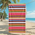 Microfiber beach towel with colorful horizontal stripes shown in a tropical seaside setting - 80*160cm / Multicolor Horizontal Stripes