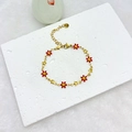 Détail de la chaîne plaquée or 18k avec marguerites en émail rouge et étoiles - Rouge Or
