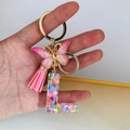 Pink tassel keychain with letter L resin charm filled with heart sequins and gold butterfly - Butterfly Tassel 8-Shape Buckle / L