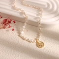 Vintage style freshwater pearl necklace with a detailed gold embossed portrait pendant - Metal Lady Head Pearl Necklace
