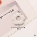 Macro view of a 2.5cm silver flower-shaped zinc alloy connector for jewelry making - C285 25mm Silver Five-Petal Flower