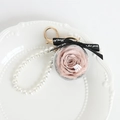 Pink preserved rose keychain in acrylic ball with white faux pearl chain and black ribbon - Nude Pink